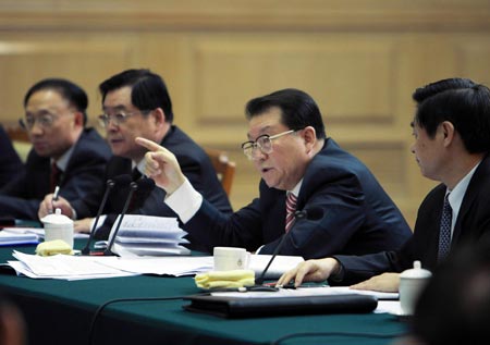 Top Chinese leaders including top legislator Wu Bangguo deliberated the government work report on Wednesday together with the country's lawmakers at the parliamentary session in Beijing.