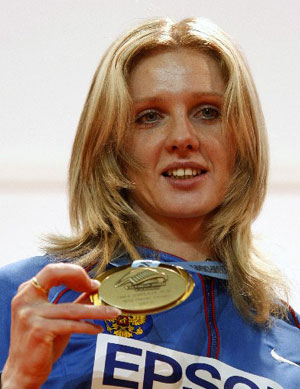 Yelena Soboleva of Russia poses with her gold medal during the award ceremony for the women's 1500 metres at the 12th IAAF World Indoor Athletics Championship in Valencia March 9, 2008. 