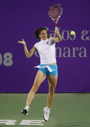 Switzerland's Patty Schnyder returns the ball to Serena Williams of the U.S during their final match at the WTA Bangalore Open tennis tournament March 9, 2008. 