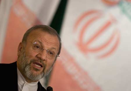 Iran's Foreign Minister Manouchehr Mottaki speaks at a nuclear conference in Tehran March 9, 2008. 