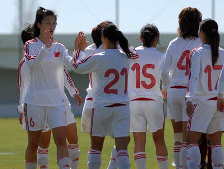 Chinese players celebrate after win a match against Portugal in the Algarve Cup women's soccer championship in Algarve, Portugal, March 12, 2008. China won 6-5 and placed the ninth.