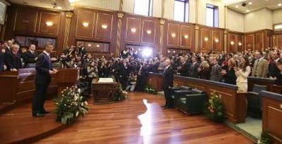 Kosovo's Prime Minister Hashim Thaci (L) speaks during a session of Parliament in Pristina February 17, 2008. Kosovo declared independence from Serbia on Sunday