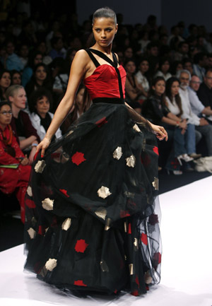 A model presents a creation from Indian designers Gauri and Nainika's Autumn/Winter 2008 collection at the Wills Lifestyle India Fashion Week in New Delhi March 12, 2008.