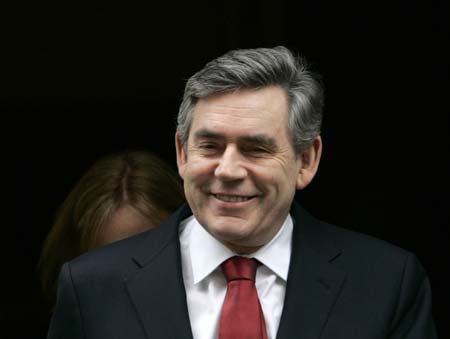 Britain's Prime Minister Gordon Brown leaves 10 Downing Street before the Chancellor's first budget announcement to the House of Commons in central London March 12, 2008. 