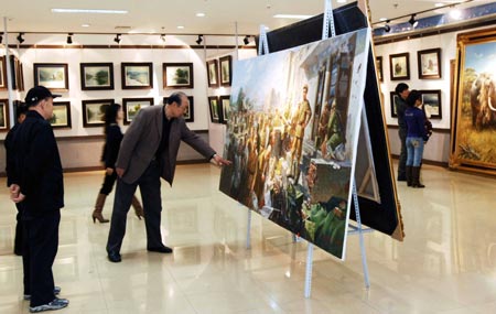 Visitors view the paintings at the painting exhibition of artists from the Democratic People's Republic of Korea (DPRK) held in Dalian, a coastal city in northeast China's Liaoning province, March 16, 2008.