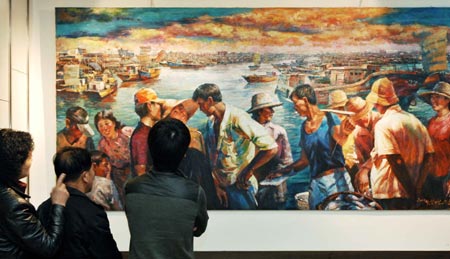 Visitors view the paintings at the painting exhibition of artists from the Democratic People's Republic of Korea (DPRK) held in Dalian, a coastal city in northeast China's Liaoning province, March 16, 2008. 