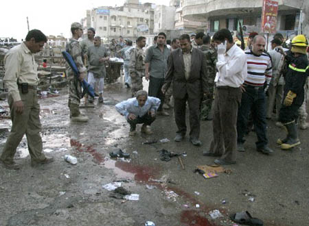 The death toll from a suicide bombing in Iraq's Shiite holy city of Karbala on Monday rose to 35, with 55 others wounded, an interior ministry source said.