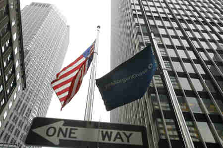 A JP Morgan Chase flag flies near the headquarters for Bear Stearns in New York March 14, 2008.