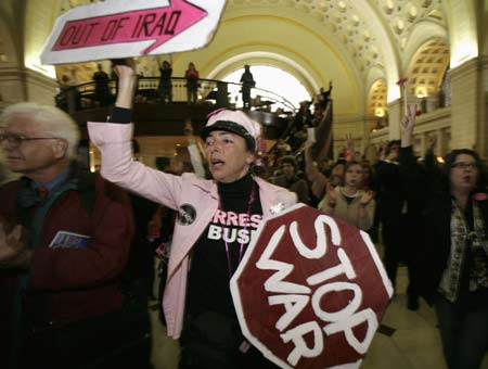 U.S. President George W. Bush defended on Wednesday the Iraq war as a "right decision" despite a high cost as thousands of Americans staged anti-war demonstrations across the nation to mark the war