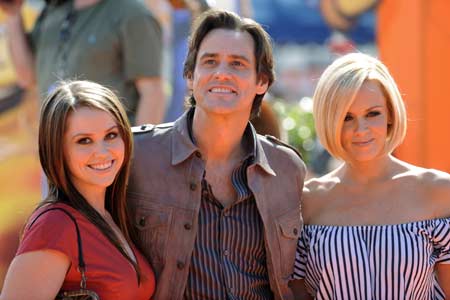 Cast member Jim Carrey (C) with daughter Jane (L) and actress Jenny McCarthy attend the premiere of the film 