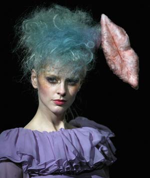 A model displays a creation by YLANG YLANG at the Tokyo Runway 2008 Spring and Summer collection March 23, 2008.