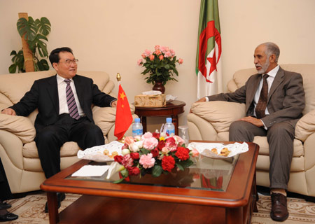 Li Changchun (L), member of the Standing Committee of the Political Bureau of the Communist Party of China (CPC) Central Committee, meets with Abdelaziz Belkhadem, Secretary-General of the Algerian National Liberation Front and also Algerian Prime Minister, in Algiers, Algeria, on March 24, 2008. 