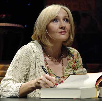 Author J.K. Rowling signs copies of her seventh and final Harry Potter book, "Harry Potter and the Deathly Hallows", during an open book tour stop at the Kodak Theater in Los Angeles Oct. 15, 2007. (Xinhua/Retuers Photo)