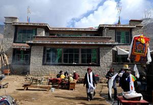 Photo taken on March 21, 2008 shows Farmer Nuosang's newly built house in Gurong Country, Duilongdeqing County of Lhasa, capital of southwest China's Tibet Autonomous Region. (Xinhua Photo/Soinam Norbu)
