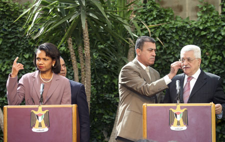 U.S. Secretary of State Condoleezza Rice (L) and Palestinian President Mahmoud Abbas prepare for a news conference in Amman March 31, 2008.