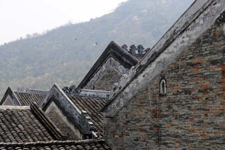  Photo taken on March 31, 2008 shows a part of the roof of a house at the architectural complex of the official residence of Cen Mi, a tusi (system of appointing national minority hereditary headmen in the Yuan, Ming and Qing dynasties) in Ming dynasty, at Nalao town, Xilin county, southwest China's Guangxi Zhuang Autonomous Region. The architectural complex, covering an area of over 4,000 square meters, was first built by Cen Mi and expanded by his posterity.