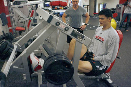 Yao Ming is doing recovering exercise on March 31, at the Toyota Center in Houston, Texas. Yao had season-ending foot surgery.