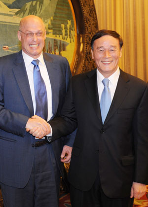 Chinese President Hu Jintao's Special Representative and Vice Premier Wang Qishan (R) meets with Henry M. Paulson (L), special representative of U.S. President George W. Bush and the U.S. Treasury Secretary, in Beijing, China, April 2, 2008. Paulson arrived in Beijing on Wednesday to start his two-day China trip for preparation for the fourth round of China-US Strategic Economic Dialogue (SED).