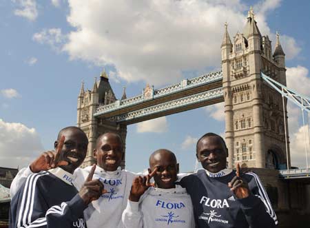 Elite Kenyan marathon runners (L-R) Luke Kibet, Martin Lel, Sammy Wanjiru and Felix Limo pose for photographers in front of Tower Bridge in London April 9, 2008, 2008.