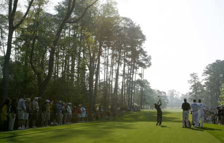 Mike Weir of Canada hits his tee shot on the 7th hole during a practice round for the 2008 Masters golf tournament at the Augusta National Golf Club in Augusta, Georgia, April 9, 2008.