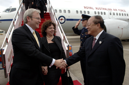 Australian Prime Minister Kevin Rudd (L) shakes hands with Li Changjiang, head of China's General Administration of Quality Supervision, Inspection and Quarantine, upon his arrival at the airport in Sanya, south China's Hainan Province, April 11, 2008. Kevin Rudd is to attend the annual meeting 2008 of the Boao Forum for Asia (BFA), to be opened in Boao, also in Hainan Province, on April 12.