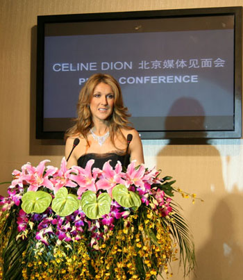 Canadian singer Celine Dion attends a TV program in Beijing, China, April 12, 2008. Dion voiced her support for the upcoming Beijng Olympic Games here on Saturday, saying she was 'definitely against boycotting' the Games. 