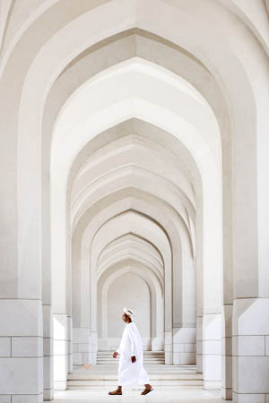 Photo taken on April 12, 2008 shows an Omani walking in the aisle of Al Alam Palace in Muscat, capital of Oman. The torch relay in Muscat, the ninth stop of the 2008 Beijing Olympic Games torch relay outside the Chinese mainland, will be held on April 14. 