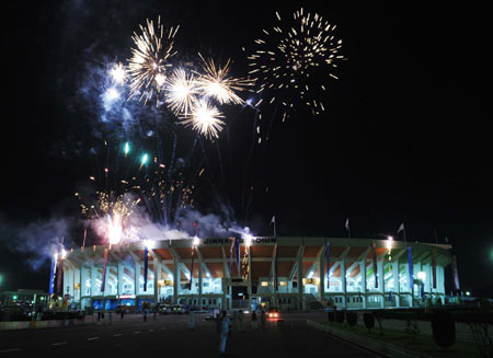  Fireworks explode over the Pakistan Sports Complex during the 2008 Beijing Olympic Games torch relay in Islamabad, capital of Pakistan, on April 16, 2008.