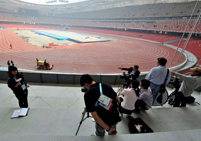 Journalists visit the National Stadium, known as the &apos;Bird&apos;s Nest&apos;, in Beijing, capital of China, Aprial 16, 2008.