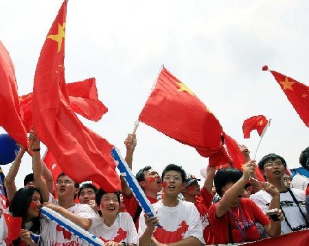 Photo: Overseas Chinese welcome Olympic torch