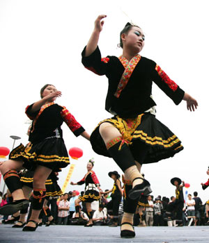 People of Miao ethnic group perform folk dance in Taijiang County of southwest China