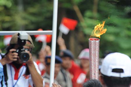 A torch is seen during the Olympic torch relay in Jakarta, capital of Indonesia, on April 22, 2008. Jakarta is the 14th stop of the 2008 Beijing Olympic Games torch relay.