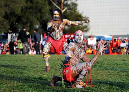 Aboriginals perform ahead of the torch relay in Canberra, capital of Australia, April 24, 2008. 