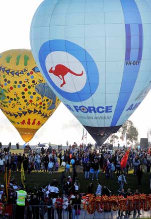 Hot air balloons are seen before the torch relay in Canberra, capital of Australia, April 24, 2008. 