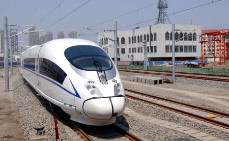 A new type of multiple unit train Hexie CRH3 pulls into the new Tianjin Station, in north China's Tianjin municipality, April 27, 2008. CRH3 has begun pilot running on the line from Beijing to Tianjin since April 26.