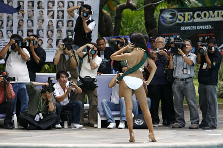 A contestant for the upcoming Miss Philippines Earth 2008 pageant poses for photographers as they are presented to the media at a hotel in Manila April 29, 2008.