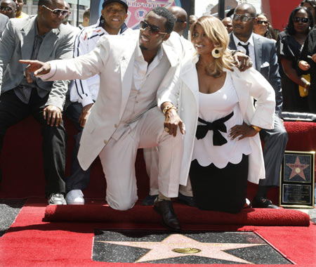 Sean Diddy Combs poses with his mother Janice as he receives a star on the Hollywood Walk of Fame in Hollywood, California May 2, 2008.