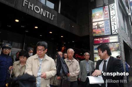 Audience exit the theater after watching the documentary film 