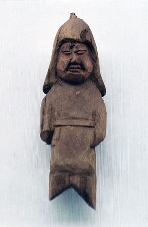 Photo taken on May 6, 2008 shows a wooden figurine unearthed from a tomb, at the Western Xia Museum near the Imperial Tombs of the Western Xia Kingdom (1038-1227) in Yinchuan, capital of northwest China