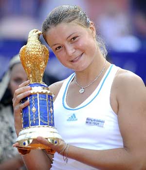 Russia's Dinara Safina hoists her trophy after her victory against compatriot Elena Dementieva in the final of the German Open in Berlin. Safina battled back from a set down to beat Elena Dementieva in an all-Russian final.