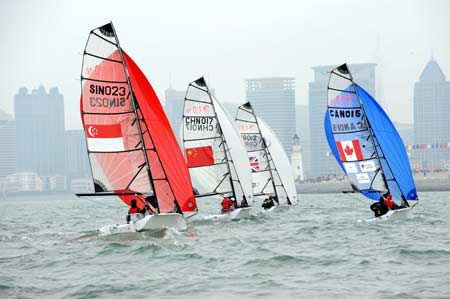 Sailboats compete during the SKUD18 competition at the 2008 International Association for Disabled Sailing (IFDS) Qingdao International Regatta in Qingdao, east China's Shandong Province, May 11, 2008.