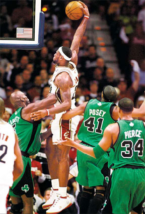 LeBron James of the Cleveland Cavaliers dunks over Kevin Garnett of the Boston Celtics in Game 4 of the 2008 NBA Eastern Conference Semifinals on Monday in Cleveland, Ohio.