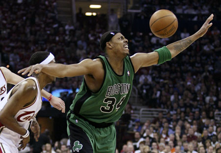 Boston Celtics Paul Pierce (34) loses the ball while being pressured by Cleveland Cavaliers Daniel Gibson during the first half of Game 4 of their NBA Eastern Conference semi-finals basketball series in Cleveland, Ohio, May 12, 2008. 