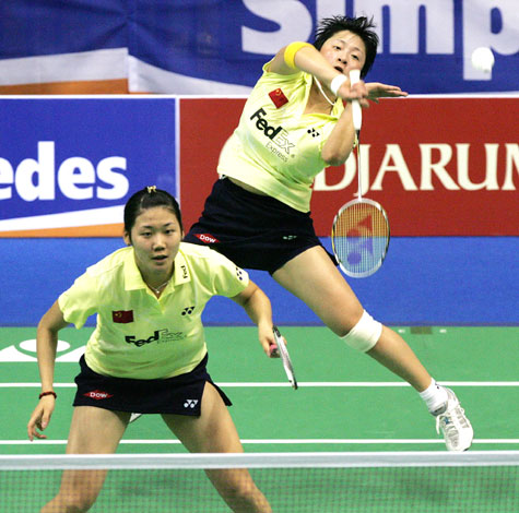 China's Zhang Yawen (back) and Wei Yili play a shot against South Korea's Lee Kyung-won and Lee Hyo-jung during their semifinal of the Uber Cup in Jakarta yesterday. The duo won 21-19, 21-8 as China eased through to the final 3-1.