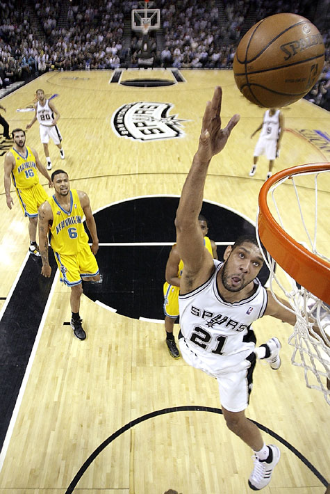 San Antonio Spurs' Tim Duncan shoots during the second quarter of Game 6 of the Western Conference semifinals against the New Orleans Hornets on Thursday.