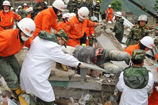 Down in the quake-damaged valley of Beichuan, rescuers have been racing against time to save lives. They've come from all over the country with a common goal. 