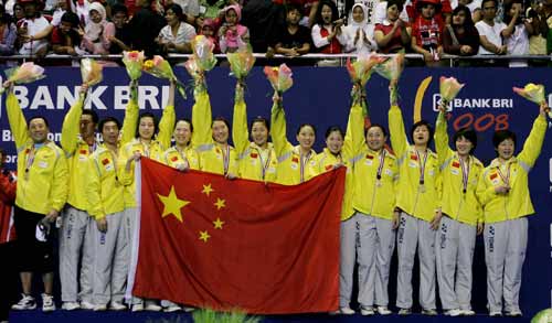 Defending champions China retained Uber Cup Saturday night after thrashing host nation Indonesia 3-0 in the Uber Cup final showdown at Bung Karno Sports Hall here. 