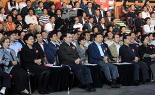 Li Changchun (3rd L, front row), member of the Standing Committee of the Political Bureau of the Communist Party of China (CPC) Central Committee, attends a benefit gala held for the quake-stricken people of Sichuan in Beijing May 18, 2008. China's performing artists and other well-known figures showed their love and generosity in the televised gala Sunday night, donating more than 1.51 billion yuan (about 216 million U.S. dollars) for quake-hit areas.(Xinhua Photo)