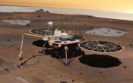 In this artist's illustration obtained from NASA on May 23, NASA's Phoenix Mars Lander is seen on the surface of Mars after landing. After traveling for almost 10 months, Mars Phoenix Lander successfully landed on the Red Planet Sunday on a mission to explore signs of life, according to NASA's Jet Propulsion Laboratory (JPL). 