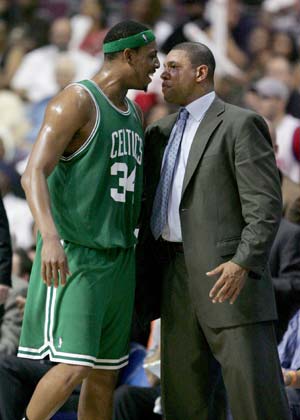 Boston Celtics head coach Doc Rivers (R) and Paul Pierce speak on the sideline as their team met the Detroit Pistons in the second quarter during Game 4 of the NBA Eastern Conference Finals in Auburn Hills, Michigan, May 26, 2008.
